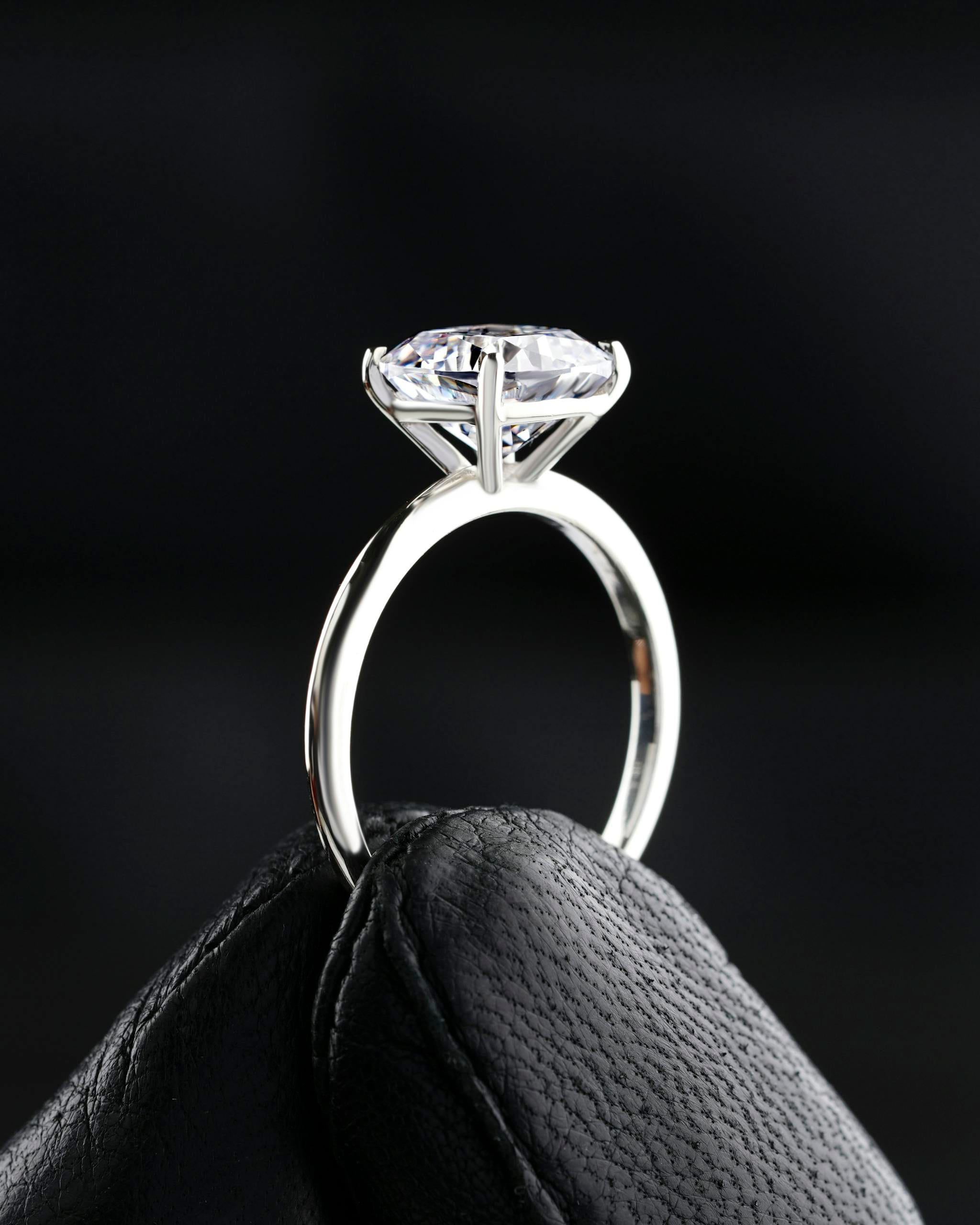 A close-up shot of a diamond ring exuding elegance and luxury, perfect for engagement themes.