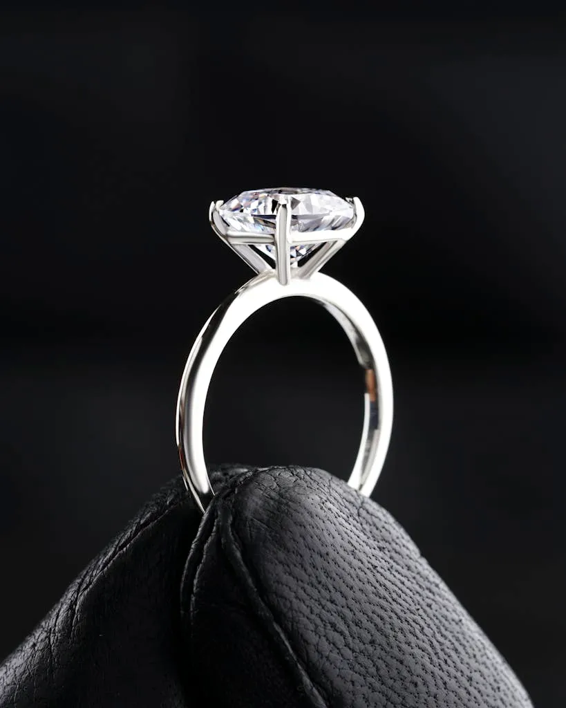 A close-up shot of a diamond ring exuding elegance and luxury, perfect for engagement themes.